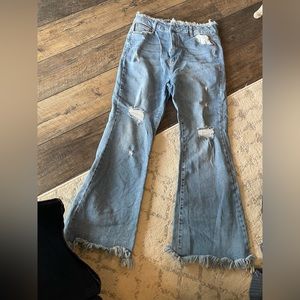 Distressed flare jeans